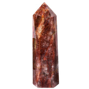 AMOYSTONE hematoid quartz obelisk tower enhances calm focus on a shelf for mindful decor and focus.