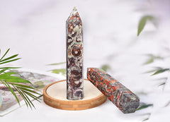 AMOYSTONE obelisk with prosperity patterns invites wealth-oriented energy into spaces