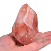 AMOYSTONE red hematoid flame tower close-up with hematite inclusions for chakra focus