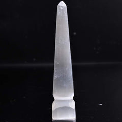AMOYSTONE Selenite Tower closeup showing delicate striations and pearl glow.
