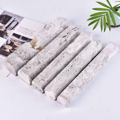 AMOYSTONE six-faceted wand showcased as a calm, decorative obelisk.