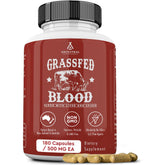 Ancestral Supplements grass-fed blood bottle on desk for energy support