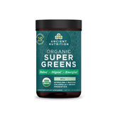 Ancient Nutrition SuperGreens powder bottle highlights peppermint flavor for digestive support.