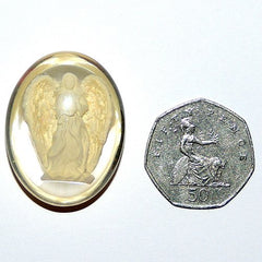 AngelStar WORRY STONE Angelight on desk, comforting keepsake during reflection