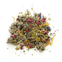 Anima Mundi Sacred Smoke herb closeup highlights mugwort, skullcap, and rose petals.