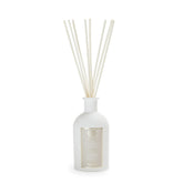 Antica Farmacista warm white diffuser bottle creating a cozy, inviting room.