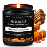 Aredenua Caramel Cinnamon candle jar front view creates cozy living room ambiance.