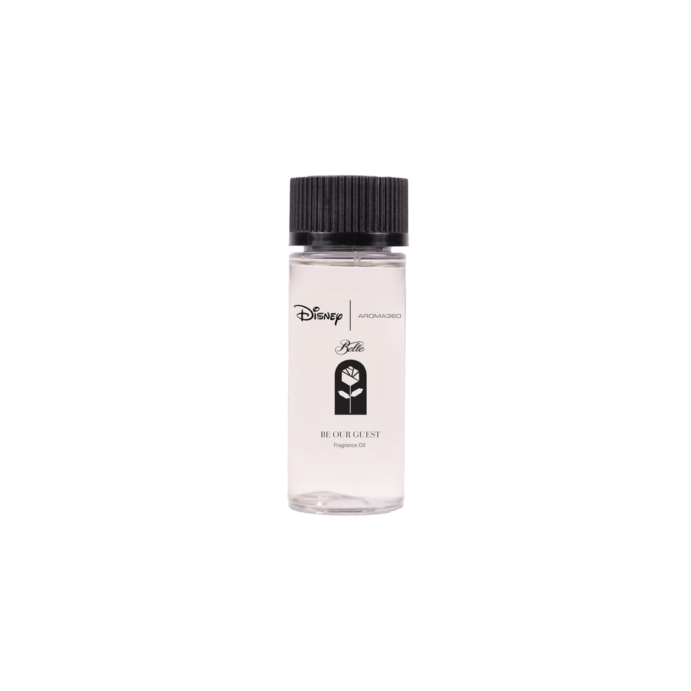 Aroma360 Be Our Guest 50ml oil bottle creates an inviting, elegant living room ambiance.