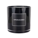 Aroma360 Black Velvet 4-Wick Candle on a chic table adds warm ambiance for living spaces