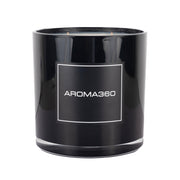 Aroma360 Black Velvet 4-Wick Candle on a chic table adds warm ambiance for living spaces
