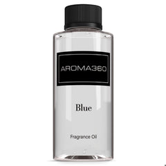Aroma360 Blue Diffuser Oil Blend bottle close-up enhances living room ambiance.