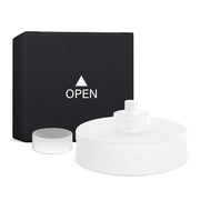 Aroma360 Fly refill bottle beside a Smart Car Diffuser, ready for swapping scents.