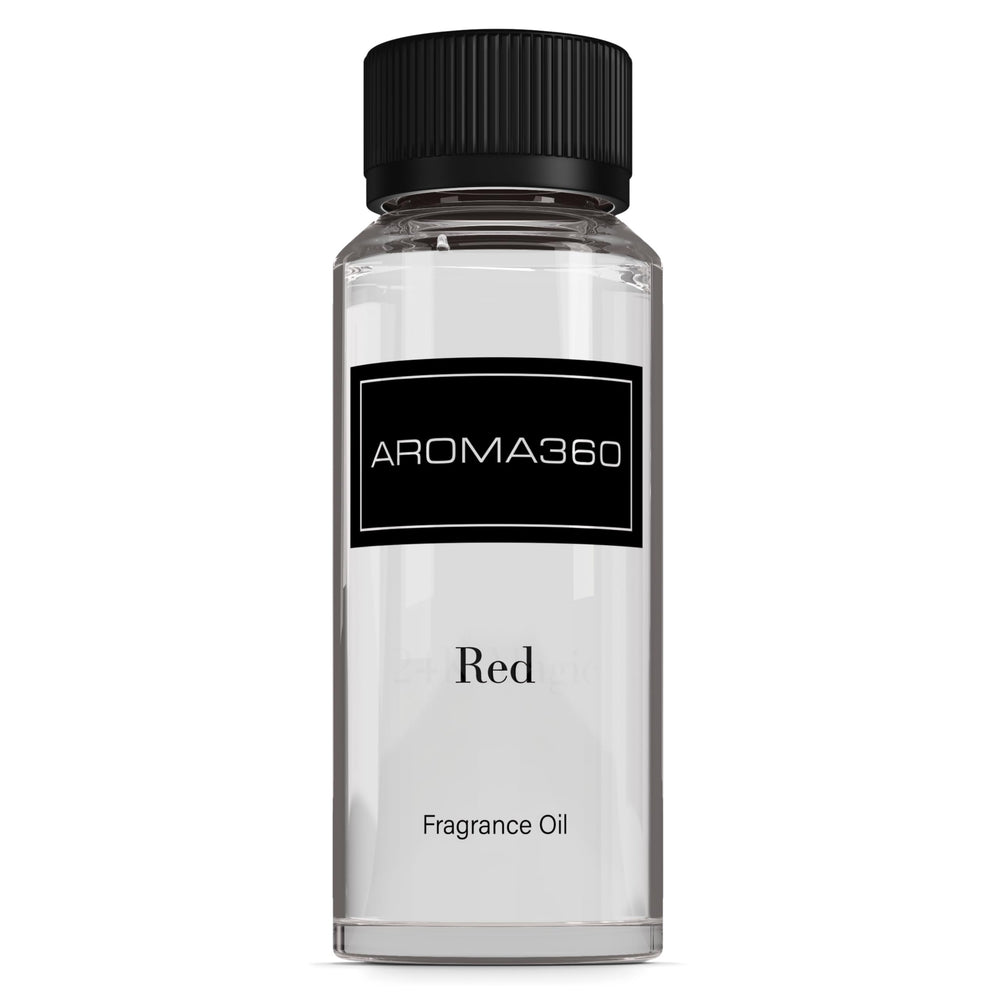 Aroma360 Red Diffuser Oil bottle pour releasing ruby grapefruit notes in a cozy living room.