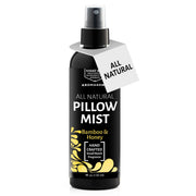 Aromasong Bamboo & Honey Pillow Spray bottle releasing a calming mist for bedtime.