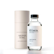 AROMASOUL hotel diffuser oil bottle pour showcasing premium scent moment
