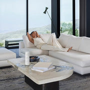 A AromaTech Ambience Diffuser in a hotel lobby scene creating welcoming ambience