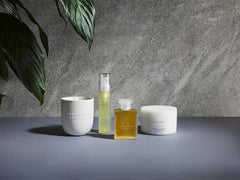 Aromatherapy Associates Deep Relax Sleep Mist vapour over a pillow invites relaxation.