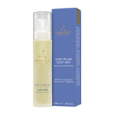Aromatherapy Associates Deep Relax Sleep Mist bottle on nightstand promotes calm evenings.
