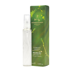 Aromatherapy Associates Forest Therapy Wellness Mist bottle pour with forest-inspired aroma