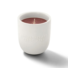 Aromatherapy Associates Rose Candle close-up showing Damask rose and geranium aroma for relaxation.