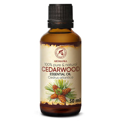 AROMATIKA Cedarwood essential oil bottle with warm amber glass and woody aroma.