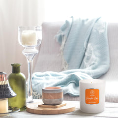 AROMATIKA Pumpkin Cake in a clear glass container enhances home decor.