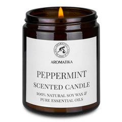 AROMATIKA peppermint candle in dining room setting, refreshing aroma.