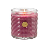 Aromatique Sparkling Currant candle in glass with bright berry notes.