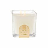 Aromatique White Amaryllis & Rosemary cube glass candle, front view, creates calming ambient fragrance