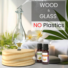 ArOmis glass diffuser on wooden base enhances natural oil integrity during use