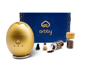 Artronic Orbby diffuser on a desk for quiet, cordless fragrance at work.