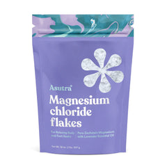 ASUTRA magnesium chloride bath flakes with lavender in the tub for a soothing soak.