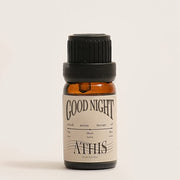 Athis Organic Essential Oil Blends bottle pour, energizing aroma for a refreshed morning.