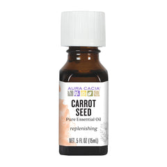 Aura Cacia carrot seed essential oil bottle for grounding aromatherapy and mood-enhancing routines