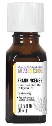 Aura Cacia frankincense in jojoba oil bottle ready for skincare use.