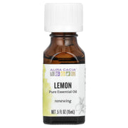 Aura Cacia lemon essential oil bottle pour, uplifting aroma for cleaning.
