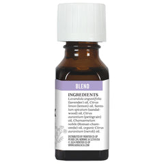 Aura Cacia Mellow Mix diffuser in a serene living room setup.