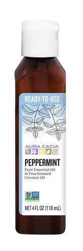Aura Cacia peppermint oil bottle pour showing ready-to-use application.