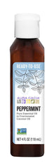 Aura Cacia peppermint oil bottle pour showing ready-to-use application.