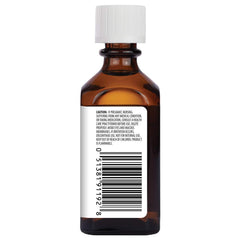 Aura Cacia Tea Tree Oil label shows purity certification and origin