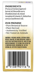 Aura Cacia Frankincense Roll-On applied to the wrist for quick inhalation.