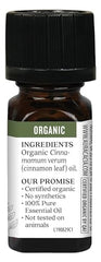 Aura Cacia Organic Cinnamon Leaf Oil label highlighting purity.