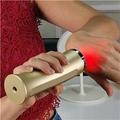 Avorla red-light facial wand close-up with LEDs, visible energy for gentle facial massage.