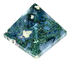 Awaken Your Kundalini Moss Agate Pyramid 2inch on desk for grounding energy.