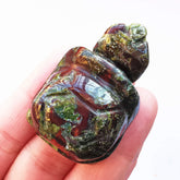 Bacatgem dragon blood jasper tortoise figurine, front view, enhances room serenity and charm.