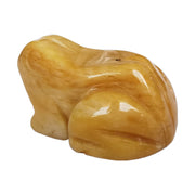 Bacatgem yellow jade frog crystal figurine on a shelf for tranquil energy