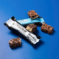 Barebells Creamy Crisp bar close-up showing indulgent texture and protein-rich satisfaction.