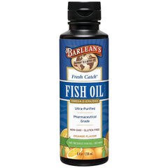 Barlean's Omega-3 liquid orange bottle on kitchen counter for easy daily supplementation.