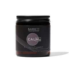 Barrett Recovery CALMg bottle on nightstand ready for calm sleep.