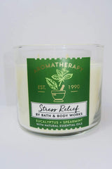 Bath and Body Works Aromatherapy Stress Relief candle with eucalyptus spearmint flame creates relaxing atmosphere.